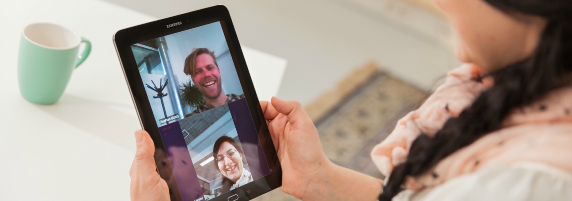 Therapist and patient conducting a video appointment